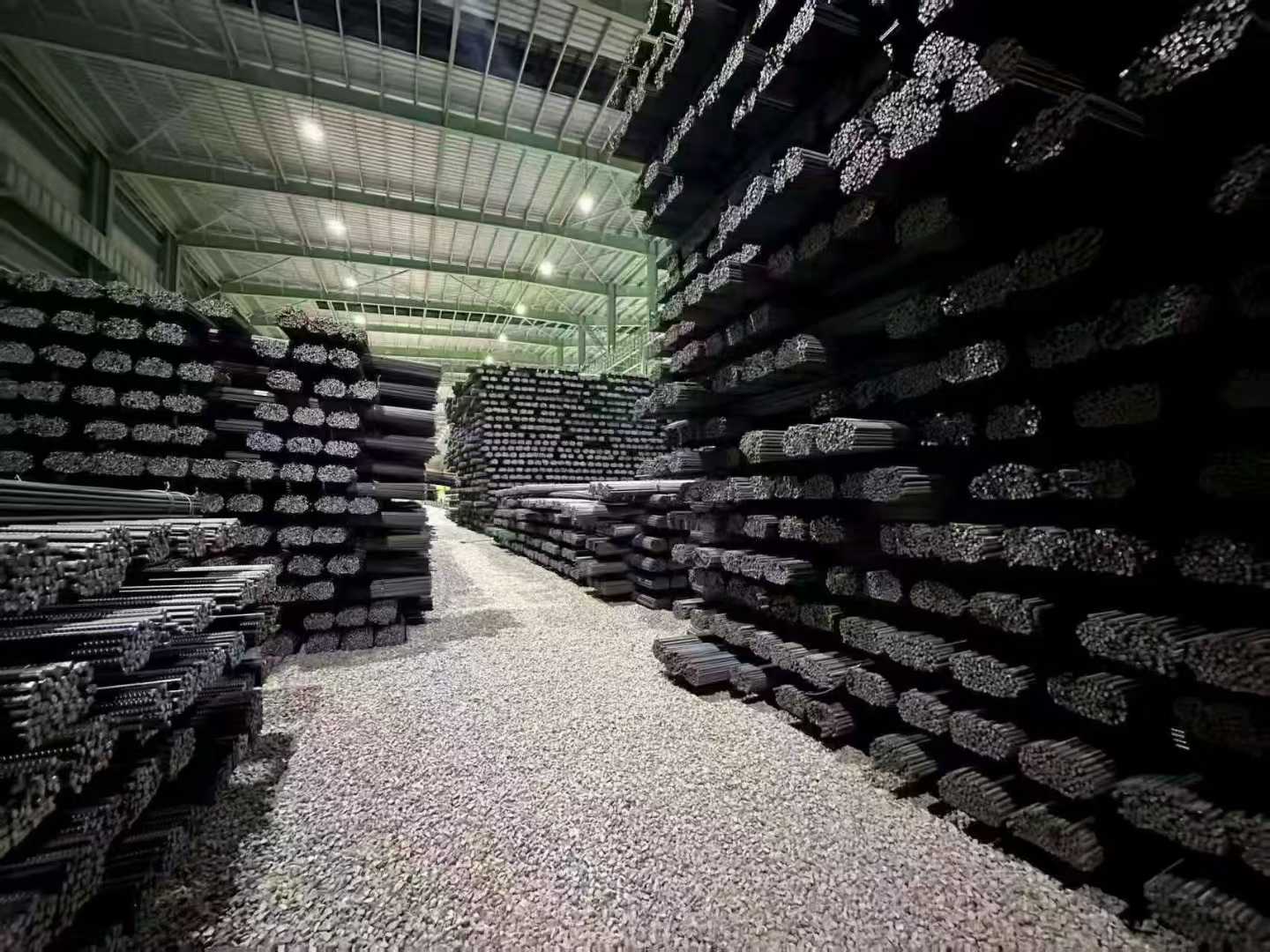 Warehouse aisles lined with reinforcing bars